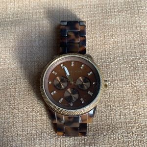 Michael Kors tortoise shell watch band. New battery